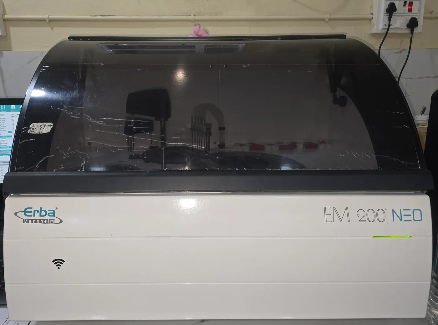 The Erba Mannheim EM 200 NEO biochemistry analyser on the laboratory bench